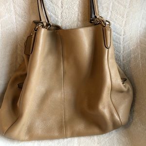 Coach Phoebe pebbled leather shoulder bag in nude.